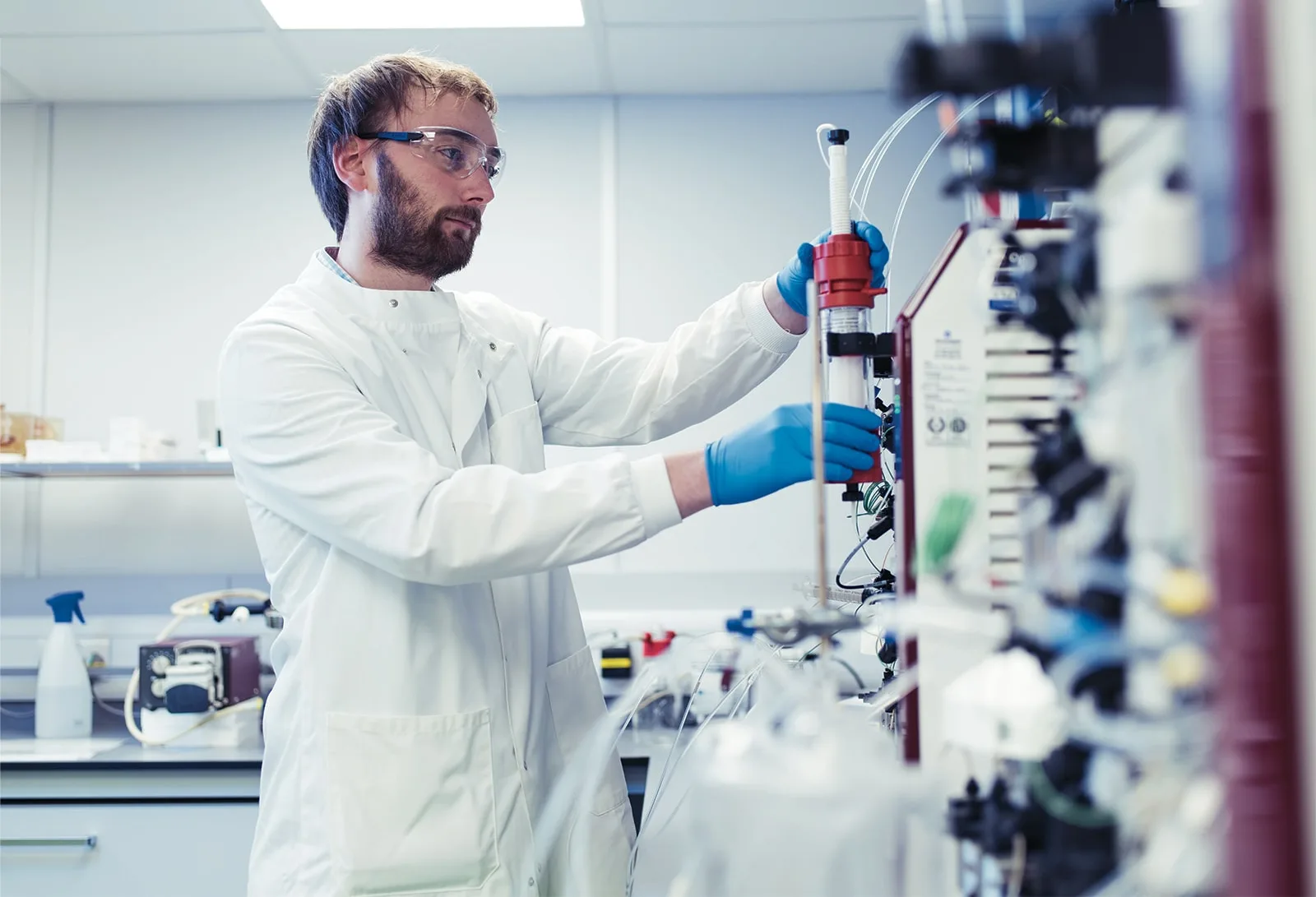 A scientist working with laboratory equipment at Bioventix